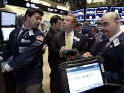 Los inversores pierden impulso ante cifras bajas del sector tecnológico. AP /