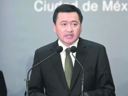 Dan puestos a conocidos. En Segob, Miguel Ángel Osorio Chong llevó a Jorge Márquez Montes. AFP /