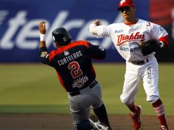 Acciones del encuentro entre los Diablos Rojos contra los Tigres de Quintana Roo. NTX /