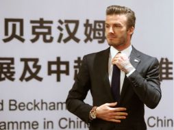 Se espera que 'Becks' visite tres veces China este año para promocionar el deporte en el país. AFP /