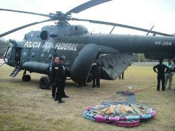 La Policía Federal apoyó la emergencia con un helicóptero y un ''helibalde'', con capacidad para dos mil 500 litros de agua. NTX /