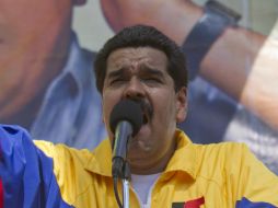 El presidente encargado de Venezuela afirma que la eficiencia socialista evita la explotación de los trabajadores. EFE /