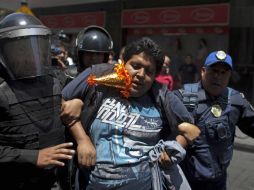 Los detenidos se encuentran bajo la disposición de la PGJDF para rendir sus declaraciones. AP /