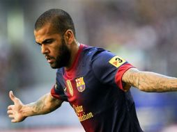 Dani Alves espera no tener problemas en la Champions ante el PSG. AP /