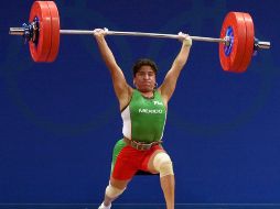En la imagen, Soraya Jiménez logra el levantamiento que el dio el oro en Sidney 2000. MEXSPORT /