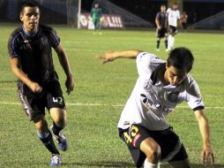 Acción del partido entre el Altamira y los Leones Negros de la Universidad de Guadalajara. ESPECIAL /