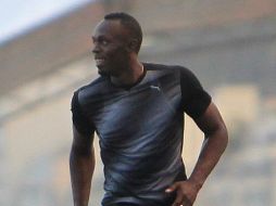 Usain logra ganar a Barros, Bailey y Quiñónez pero no llega a batir su marca. EFE /