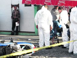 La escena del crimen en Lomas de Tabachines. En los dos ataques se usaron pistolas 9 milímetros. EL INFORMADOR /