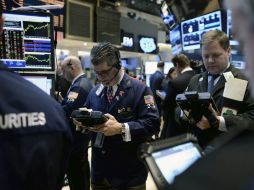 Algunos analistas culpan las pérdidas en la bolsa a la escalada de la tensión entre Corea del Norte y EU. ARCHIVO /