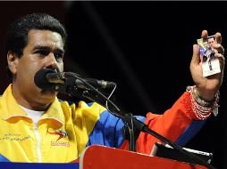Maduro pidió a los otros aspirantes a la Presidencia que se manifiesten y digan si van a respetar los resultados de los comicios. AFP /