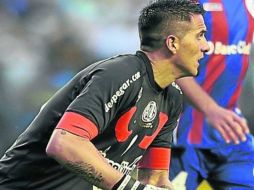 El portero es señalado por estar vinculado al homicidio de un ''barra brava''. EFE /