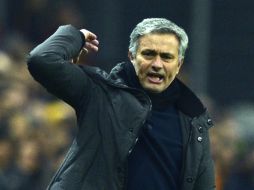 Actualmente, el entrenador luso tiene a los merengues en semifinales de la Champions League. AFP /