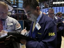 Vincent Quinones en el centro Wall Street. AP /
