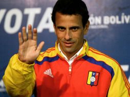 El candidato de la oposición opina que ''mañana tiene que ser el triunfo de Venezuela''. AP /