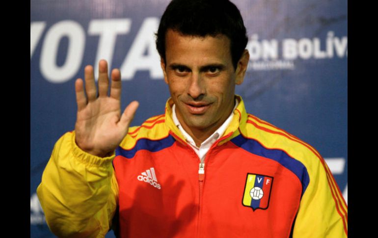 El candidato de la oposición opina que ''mañana tiene que ser el triunfo de Venezuela''. AP /