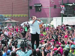 El candidato oficialista Nicolás Maduro ganó la presidencia por menos de 300 mil votos de diferencia, según los datos del CNE. AFP /