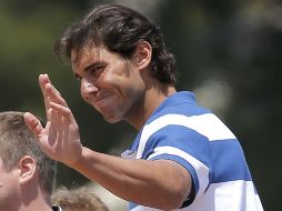 El tenista asegura que su rodilla va mejorando cada semana. AP /