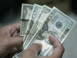 Al finalizar la jornada, el menor precio máximo a la compra en centros cambiarios de Mérida es de 11.89 pesos. ARCHIVO /