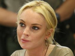Lindsay Lohan aún piensa visitar cinco centros junto a su abogado, Mark Heller, para elegir uno. ARCHIVO /