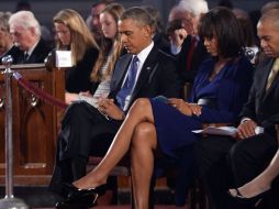 El presidente estadounidense, Barack Obama y su esposa, Michelle, durante el servicio en honor a las víctimas. AFP /