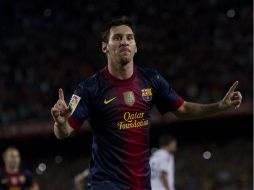 Messi (en la imagen) y Busquets están enfocados en el partido contra la escuadra alemana. ARCHIVO /