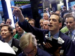 El Dow Jones había llegado a restar casi 100 puntos esta jornada, cerrando con un pequeño ascenso. AP /