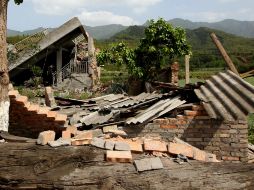 Imagen de casas dañadas en Longmen, lugar cercano al epicentro del sismo. AFP /