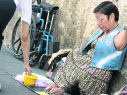 PILAR. Doña Trini, de 54 años, está casada desde hace 20 años con su segunda pareja, es abuela de tres, y sostén de ocho personas. ESPECIAL /