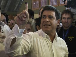 La consultora ICA le da el triunfo electoral a Cartes con el 59.7 por ciento. AFP /