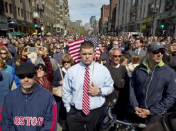 Miles de ciudadanos de Boston se concentraron en las calles para recordar a las víctimas. AP /