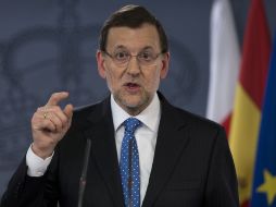 El presidente del gobierno español, Mariano Rajoy, anuncia que se estudia la probabilidad de adoptar nuevos recortes. AP /