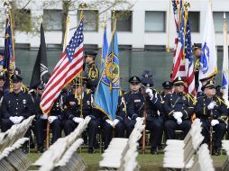 Ceremonia en recuerdo del agente de la policía del MITque perdió la vida en la persecución de los sospechosos. EFE /