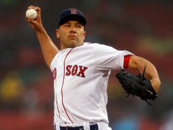 Alfredo Aceves tendra que recuperar su lugar en Boston desde Triple A. AFP /