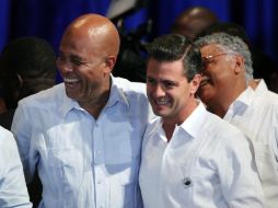 El Presidente Peña Nieto junto con el mandatario de Haití, Michel Martelly, durante su visita a Puerto Príncipe. EFE /