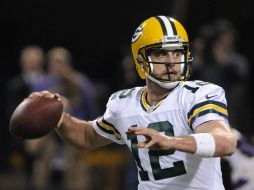 Aaron Rodgers seguirá al comando de los Empacadores. AP /