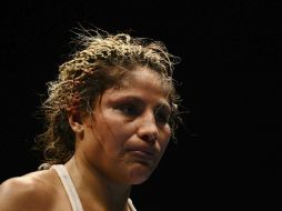 Juárez fue derrotada en poco tiempo y causa la sorpresa de los asistentes a la pelea. ARCHIVO /