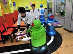 La robótica en China crece con rapidez, pues muchos androides han reemplazado a los trabajadores humanos. ARCHIVO /