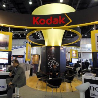 Kodak cede dos actividades para saldar deuda