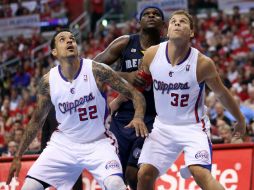 Zach Randolph (c) se apunta 25 unidades y 11 rebotes durante el encuentro. AFP /