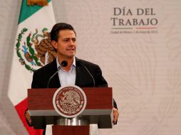 Enrique Peña Nieto encabeza un acto conmemorativo del Día del Trabajo en Los Pinos. NTX /