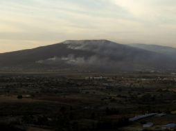 El comportamiento del viento arrastra la humareda de los incendios que afectan a la ZMG a la población.  /