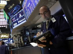 Después de iniciar el día con ganancias, la Bolsa de Nueva York cierra con nuevo récord en su indicador S&P 500. AP /