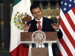 Enrique Peña Nieto resalta la importancia de asegurar un México en paz como uno de los ejes de su gobierno. AP /
