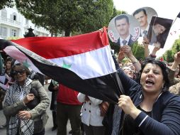 Simpatizantes del presidente sirio Bashar al Asad protestan en Túnez. EFE /