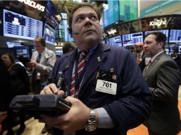 El S&P 500 cierra con un récord al subir 0.19 por ciento hasta los mil 617.5 puntos. AP /