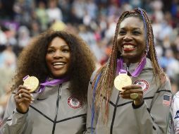 Fruto de un esfuerzo bien enfocado y perseverancia: Venus y serena Williams muestran sus medallas de oro en Londres 2012. ARCHIVO /