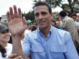 La encuesta del Ivad le otorga a Capriles una intención de voto del 45.8 por ciento, cinco puntos porcentuales sobre Maduro. ARCHIVO /