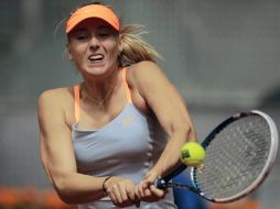 En una hora y 42 minutos, Maria vence a su rival. AP /