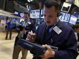 El índice estrella de la Bolsa de Nueva York cierra con pérdida de 22.50 puntos. AP /