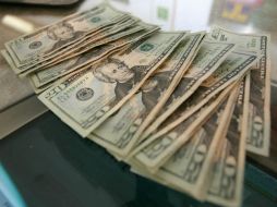 El mayor precio a la compra en casas de cambio de Monterrey es de 11.60 pesos. ARCHIVO /